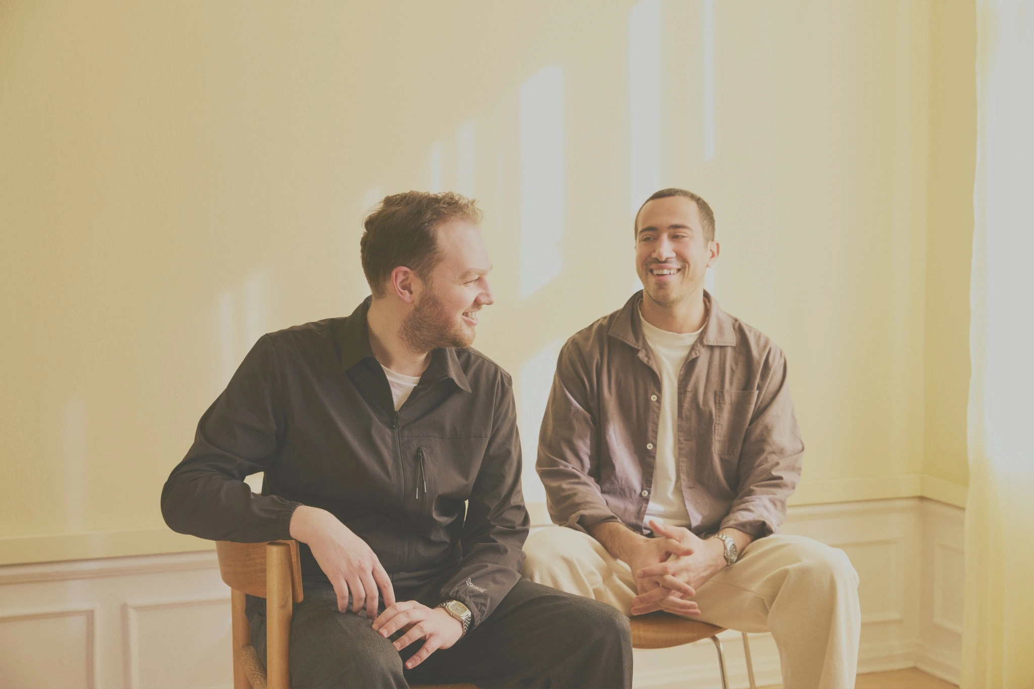 Two Spread team members in conversation during a creative collaboration session